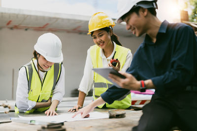 Rear view of man working at office