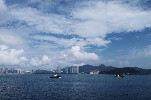 nautical vessel, waterfront, transportation, mode of transport, water, boat, sea, sky, sailing, cloud - sky, sailboat, travel, nature, river, cloud, tranquility, cloudy, architecture, scenics, city