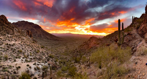 Scenic view of mountains against sky during sunset