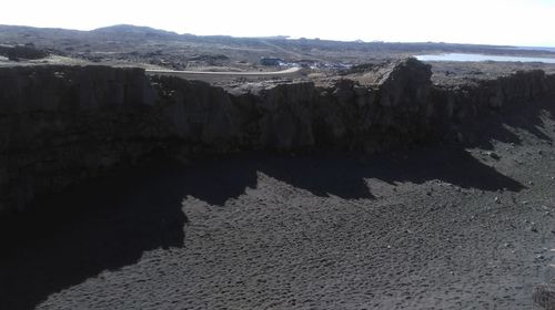 Shadow on mountain against sky