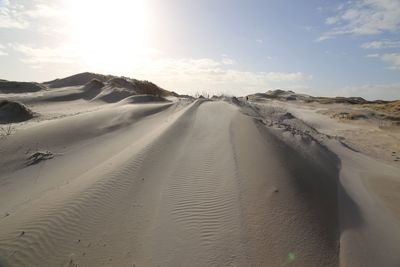 Scenic view of desert against sky