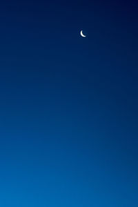 Low angle view of moon in sky