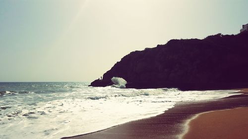 Scenic view of beach against sky