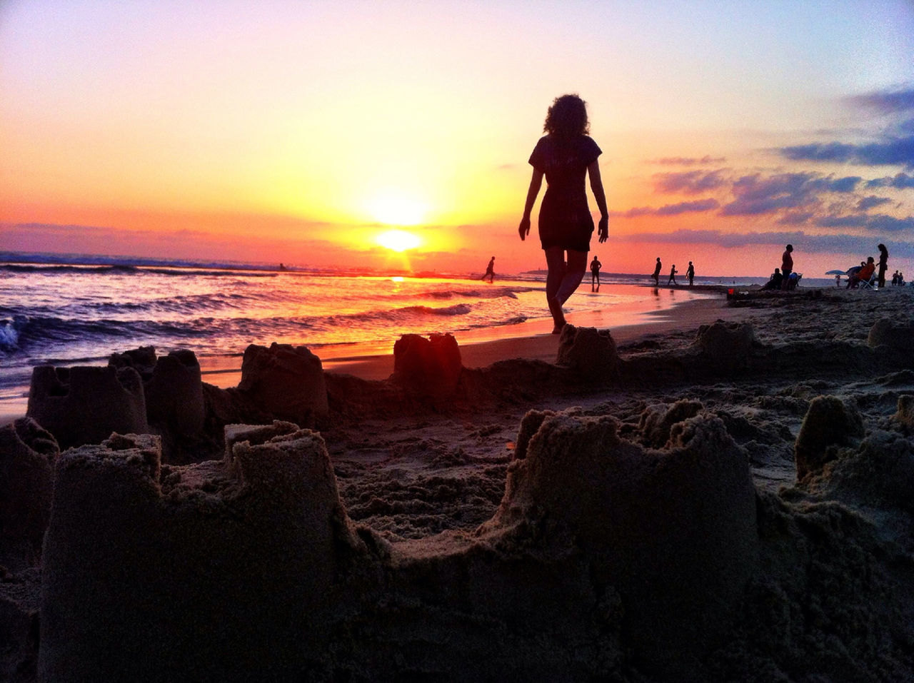 sunset, sea, horizon over water, beach, water, sun, shore, orange color, scenics, sky, beauty in nature, leisure activity, lifestyles, tranquil scene, tranquility, idyllic, nature, vacations