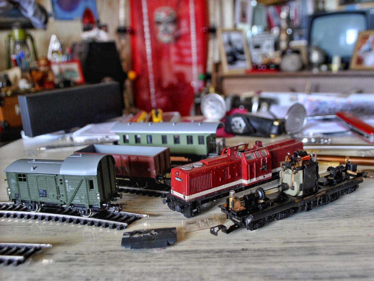 CLOSE-UP OF TOY CAR ON TABLE AT HOME