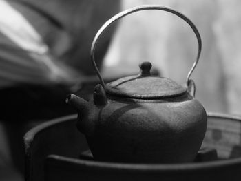 Close up of teapot in container