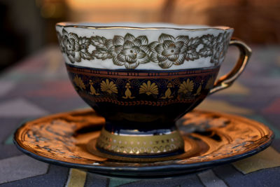 Close-up of coffee cup on table