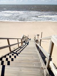 High angle view of staircase at beach