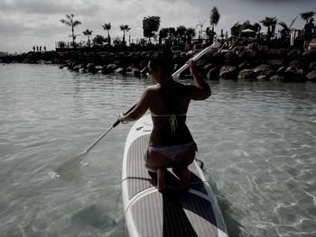 Woman standing in water