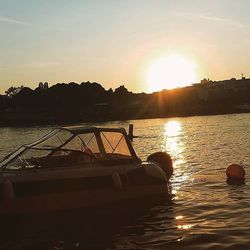 Scenic view of sunset over river