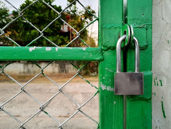 Close-up of closed metal fence