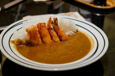 Close-up of food in plate on table