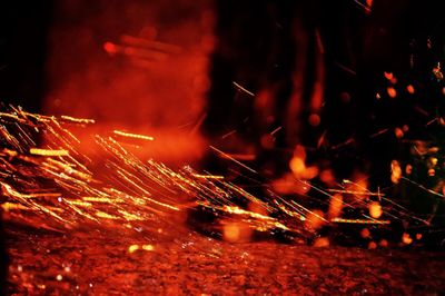 Close-up of firework display at night