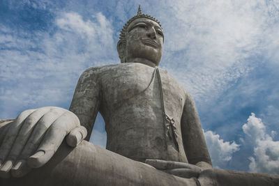 Low angle view of statue against sky