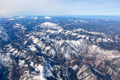 Panoramic view of alps in the winter . mountains range landscape view from above 