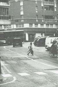 People walking on street in city