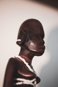Close-up of statue against black background
