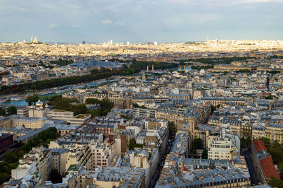 Aerial city landscape of paris, lots of roofs characteristic roofs and chimney