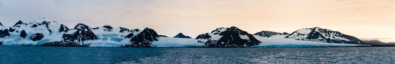 Scenic view of sea against sky during winter