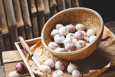 High angle view of eggs in basket on table
