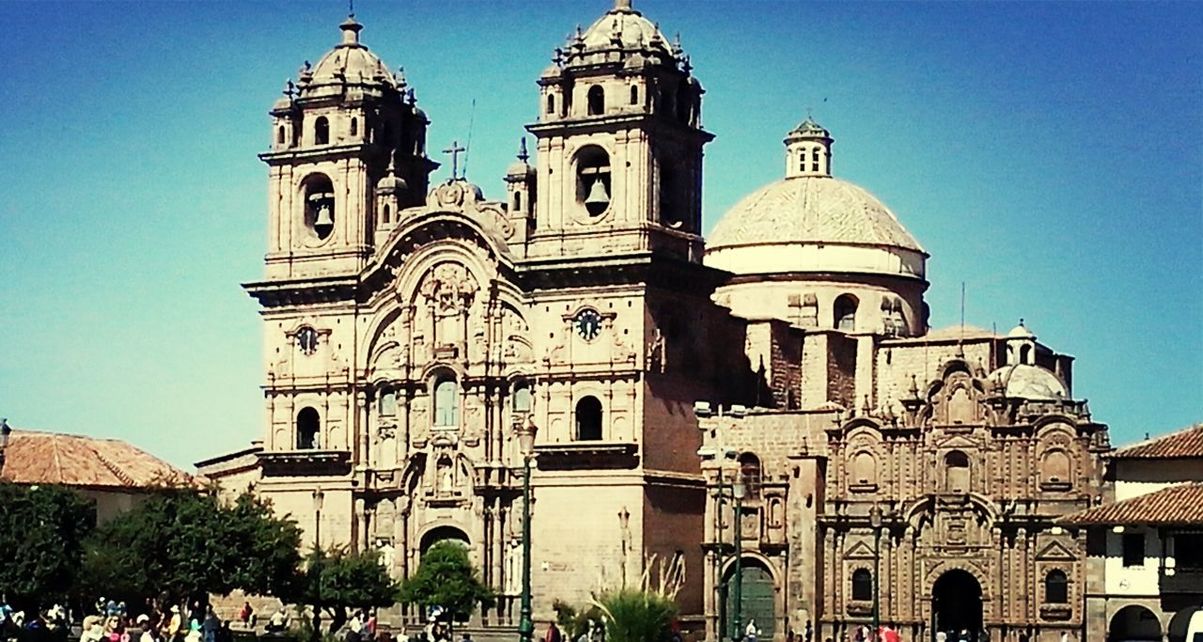 religion, place of worship, church, spirituality, building exterior, architecture, built structure, cathedral, low angle view, clear sky, cross, dome, blue, facade, tower, sky, steeple, travel destinations