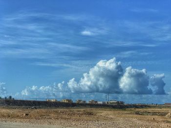 Scenic view of land against sky