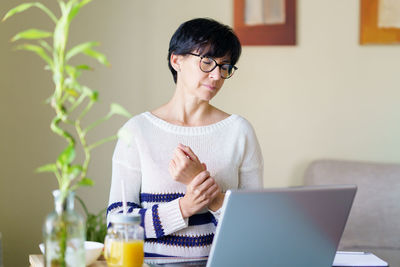 Tired woman working from home