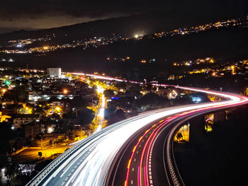 High angle view of illuminated city at night