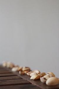 Close-up of chocolate on table against white background