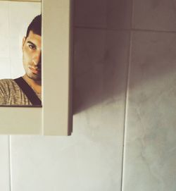 Portrait of young man looking away