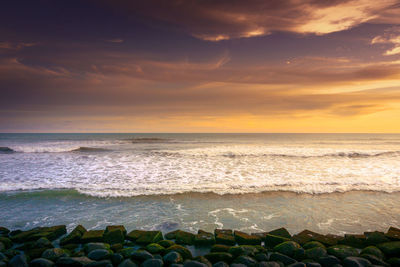 Scenic view of sea against sky during sunset