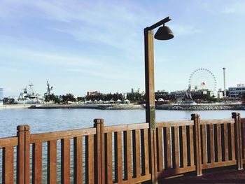 Pier on river in city