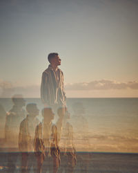 Multiple image of man at beach during sunset