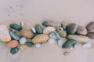 High angle view of stones on beach