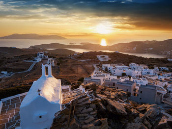 Panoramic view of townscape against sky during sunset