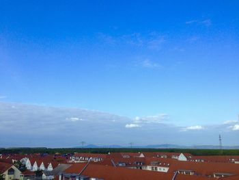 Built structure against blue sky and clouds