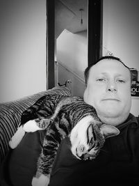 Portrait of young woman at home