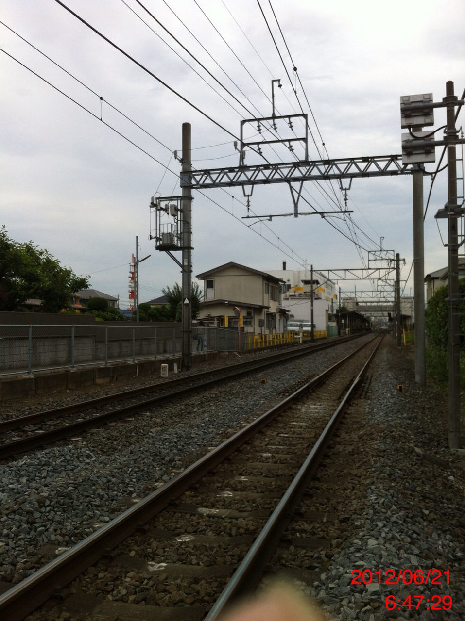 railroad track, rail transportation, power line, electricity pylon, transportation, public transportation, power supply, railroad station platform, railroad station, cable, electricity, sky, railway track, power cable, train - vehicle, connection, fuel and power generation, diminishing perspective, technology, the way forward