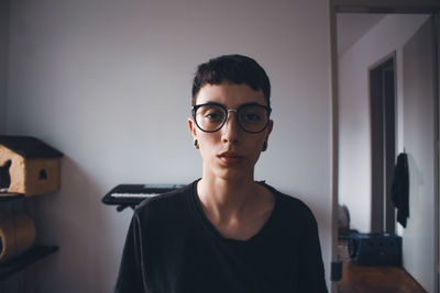 Portrait of young woman wearing sunglasses