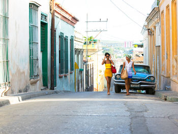 People walking on street in city