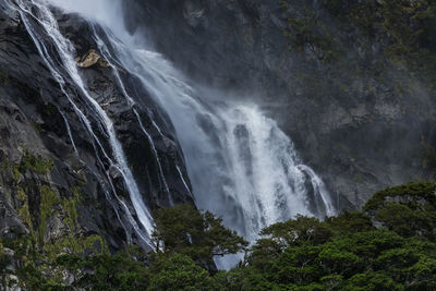 Waterfalls at fiordland national park, milford sound, te wahipounamu world heritage, new zealand