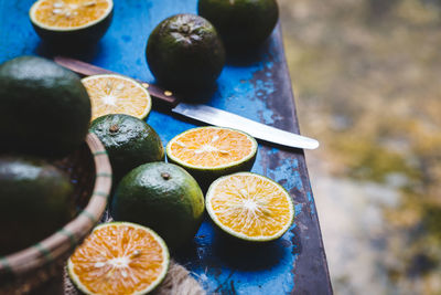High angle view of fresh key lime fruits on table