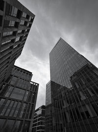 Low angle view of modern buildings against sky