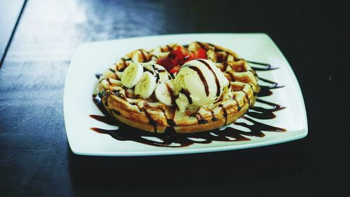 Close-up of dessert in plate on table