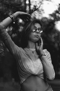 Portrait of young woman wearing sunglasses