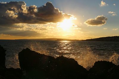 Scenic view of sea against sky during sunset