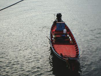 High angle view of rowboat sailing in sea