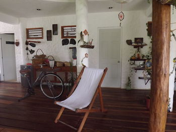 Empty chairs and tables on floor at home