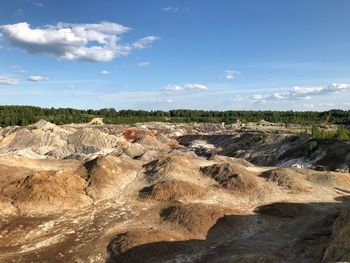 Rocks on land against sky