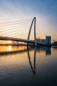 Thu thiem 2 bridge is reflected at the sunrise moment